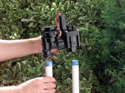 one of our Bonney Lake sprinkler repair experts is installing a new sprinkler valve