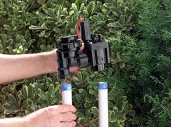 one of our Bonney Lake sprinkler repair experts is installing a new sprinkler valve